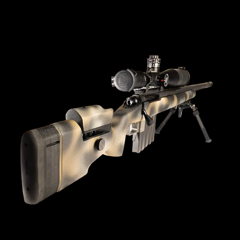 The lightweight **Cheytac M300 Praetorian sniper rifle by B&B Firearms**, favored by competitive shooters, features a long barrel with a bipod near the muzzle, a large scope on top, and a camouflage-patterned stock. Its ergonomic design includes an adjustable cheek rest and a magazine protruding from the bottom. The background is white.