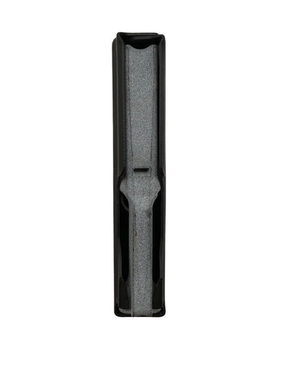 A black rectangular metal object with three vertical indentations resembles a component of the Cheytac M200 .408/.375 Magazine. The right edge features a protruding notch-like structure, and the upper right corner is slightly angled. The matte surface shows signs of mild wear, set against a solid white background. This product is manufactured by B&B Firearms.