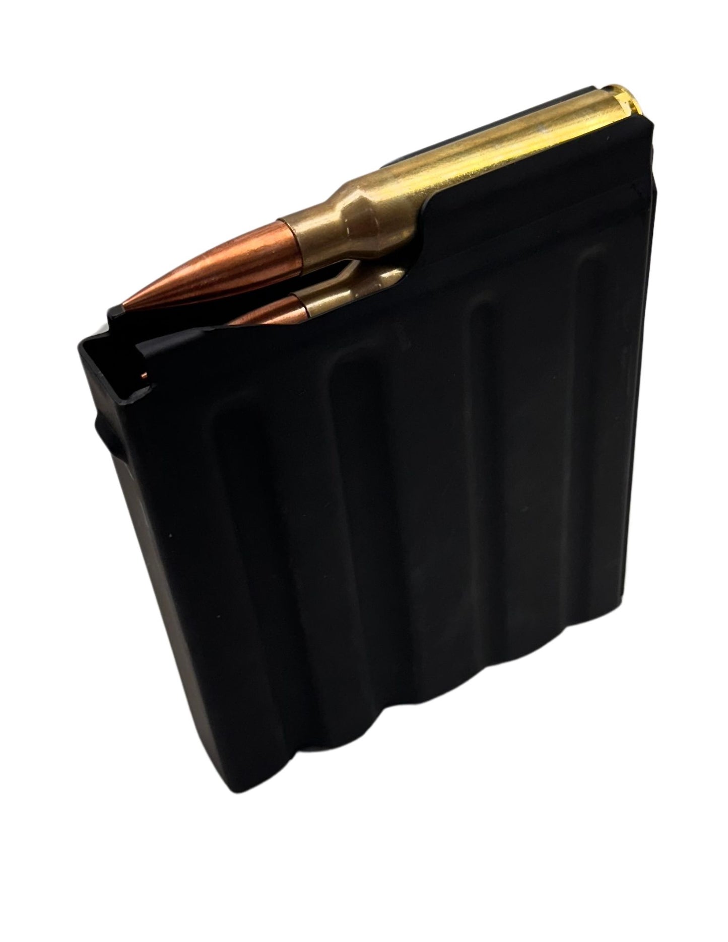 A black rectangular metal object with three vertical indentations resembles a component of the Cheytac M200 .408/.375 Magazine. The right edge features a protruding notch-like structure, and the upper right corner is slightly angled. The matte surface shows signs of mild wear, set against a solid white background. This product is manufactured by B&B Firearms.